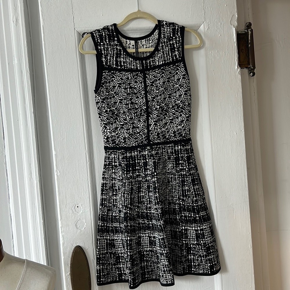 Well fitting beautiful Andrew Marc dress. Brand new never worn